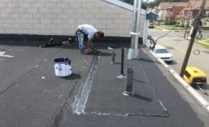 flat roof repair 300x182 1 Roofing